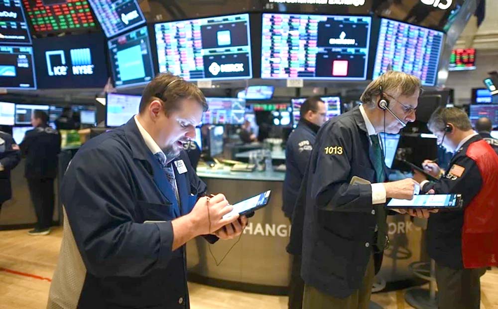 Chứng khoán Mỹ tăng mạnh sau quyết định giữ nguyên lãi suất của Fed